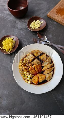 Pempek Or Empek-empek Or Fish Cake Is A Food Made From Soft Ground Fish Meat Mixed With Tapioca Flou