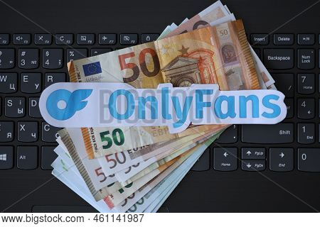 Ternopil, Ukraine - September 6, 2022 Onlyfans Paper Logotype On Bunch Of Euro Bills Lies On Black L