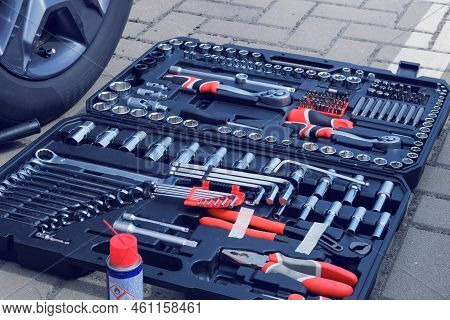 Toolset Near The Auto. Mechanical Workshop Tools In Box. Using Different Repair Tools For Repairing 