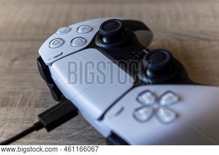 Brecht, Belgium - August 14 2022: A Portrait Of A White Basic Playstation 5 Controller Which Is Char
