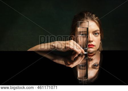 Contemporary Art Portrait Of Pretty Girl Looking Through Glass Of Water. Object Distortion, Optical 