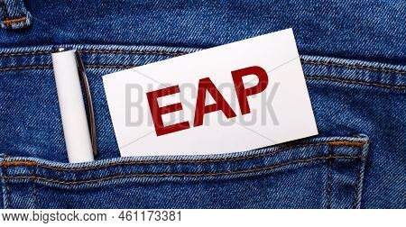 The Back Pocket Of Blue Jeans Contains A White Pen And A White Card With The Text Eap Employee Assis