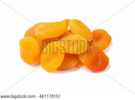 A Group Of Dried Apricots Isolated Over White Background.