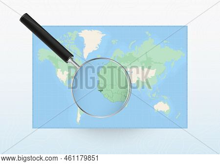 Map Of The World With A Magnifying Glass Aimed At Guinea-bissau, Searching Guinea-bissau With Loupe.