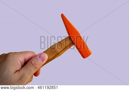 Hand Held Wooden Handle Hammer And Orange Head, Isolated Blue Background, Straight Peen Hammer, Sele