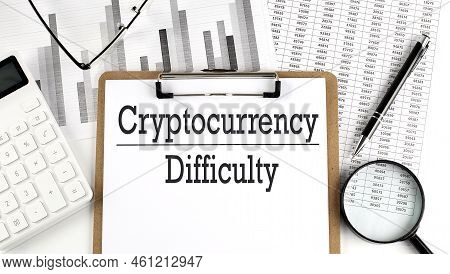 Paper With Cryptocurrency Difficulty Table On A Charts, Business Concept
