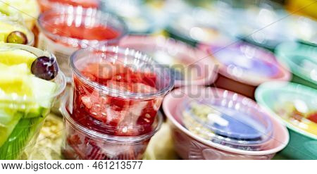 Pre-packaged Fruit Salads Displayed In A Commercial Refrigerator