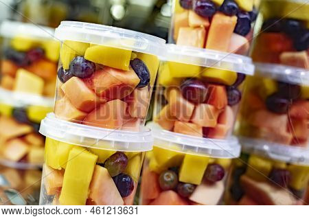 Pre-packaged Fruit Salads Displayed In A Commercial Refrigerator