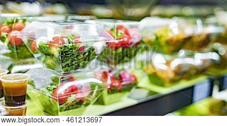 Vegetable Salads Displayed In A Commercial Refriger