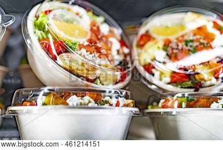 Pre-packaged Ready To Eat Meals Displayed In A Commercial Refrigerator
