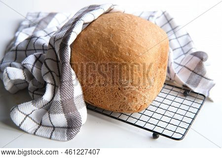 Home Baked Farmhouse Mixed Bread. Close-up On Loaf Of Bread Baked In Baking Machine. Whole Wheat Bre
