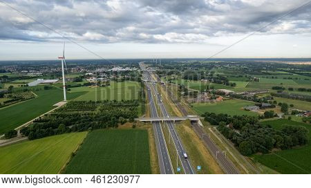 Brecht, Belgium, 6th Of July, 2022, Panoramic Aerial Drone View Of Wind Farm Or Wind Park, With High
