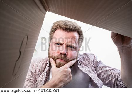 Man Unpacked The Delivered Box With The Parcel, He Frowns And Gets Angry, They Brought Him Not What 
