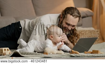 Adult Caucasian Dad Bearded Single Father With Newborn Baby Making Video Call To Mother Or Relatives
