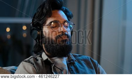 Portrait Arab Multiracial Man Millennial Guy 30s Male With Beard Brunette In Headphones Sitting At H