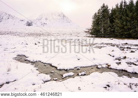 Beautiful Winter Sunrise Landscape Image Of River Etive In Rannoch Moor In Socttish Highlands With G