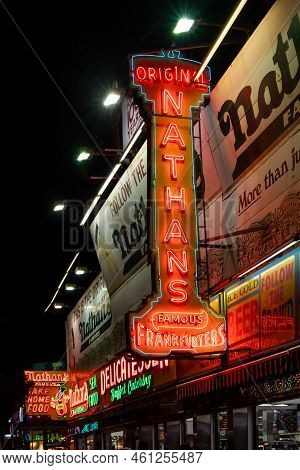 New York, Ny - Usa - Sept 3, 2022 Vertical Night-time View Of The Historic Nathan's Flagship Restaur