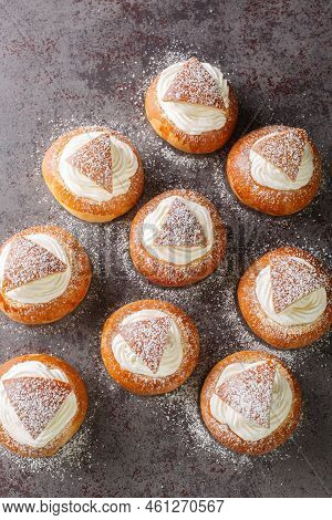 Traditional Winter Sweet Semla Semlor Or Fastlagsbulle Flavored With Cardamom, Filled With Almond Pa