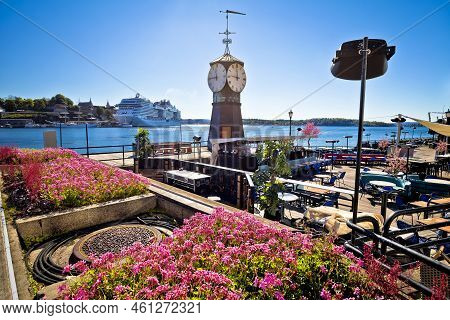 Scenic Harbor Of Oslo In Aker Brygge With Clock Tower View, Capital City Of Norway