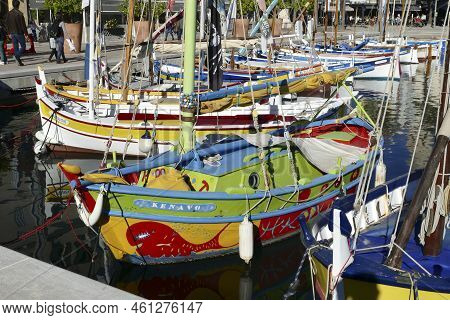 Sanary Sur Mer, France - November 6, 2021: Scenic View To Harbor With Colorful Wooden Fishermens Boa