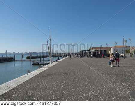 Lisbon, Portugal, October 24, 2021: View Of Doca Da Marinha, Small Marina With Boats And Restaurants