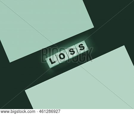 Wooden Cubes With Loss Word On Blacktable. Financial Loss Busines Concept