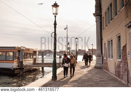 Venice, Italy - April, 21: Tourists Next To Boarding Area For The Vaporetto In Venice On April 21, 2