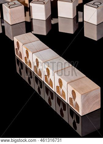 Customer retention concept and attracting potential customers on wooden cubes