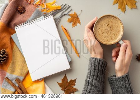 First Person Top View Photo Of Female Hands In Sweater Holding Cup Of Coffee Notepad Pen Plaid Yello