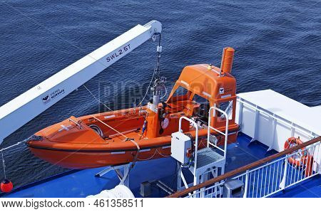 Vaasa, Finland - June 20, 2022: Orange Lifeboat On Large Ferry