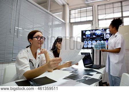 Group Of Medical Student Study In Class Room. Medical Students Studying Human Brain Disease Diagnosi