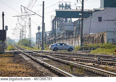 Ryazan Russia - August 30, 2022: Car Driving Through A Railroad Crossing. Railroad Crossing. Railroa