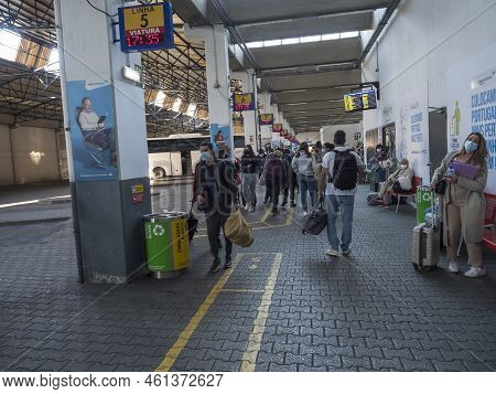 Lisbon, Portugal, October 24, 2021: Passengers Waiting For The Bus On Platform Of Sete Rios Bus Term