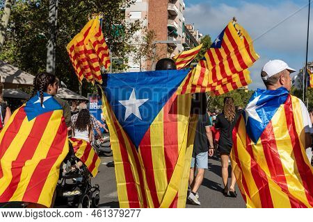 Barcelona, Catalonia, Spain - September 11, 2022: People Participating In The Demonstration Of The N