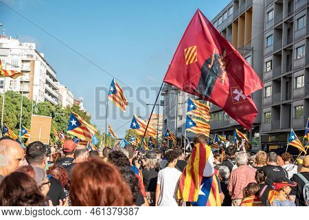 Barcelona, Catalonia, Spain - September 11, 2022: People Participating In The Demonstration Of The N