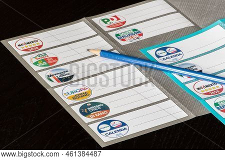 Roma, Italy - September 12 2022: Italian general election 25 September 2022 for Chamber of Deputies and Senate of the Republic. Voting paper, ballot paper with party symbols and pencil