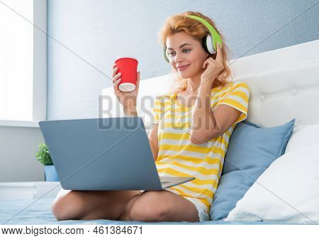 Cheerful Girl Blogger With Coffee Has Webinar. Blogger Girl Having Webinar. Girl Watch Webinar