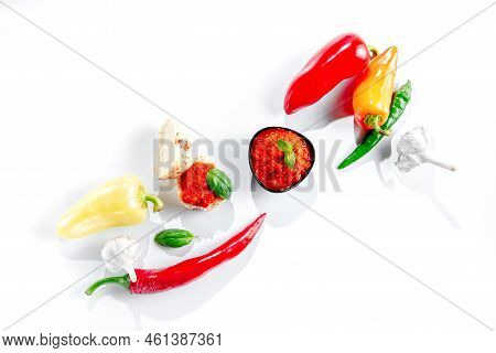 Ajvar With Ingredients On White Background Top View. Ajvar Homemade.