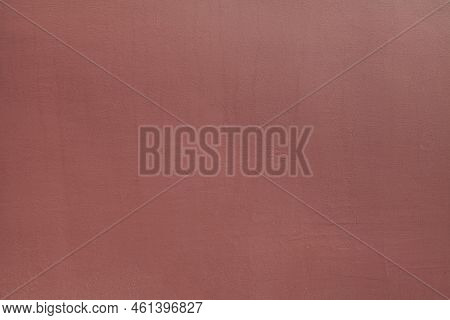 Rufous Or Dark Brown Wall, Texture, Background. The Building Wall, Painted With Water-based Paint Of