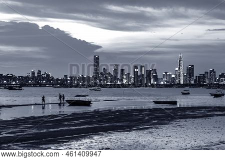 Skyline Of Shenzhen City, China At Dusk. Viewed From Hong Kong Border Lau Fau Shan