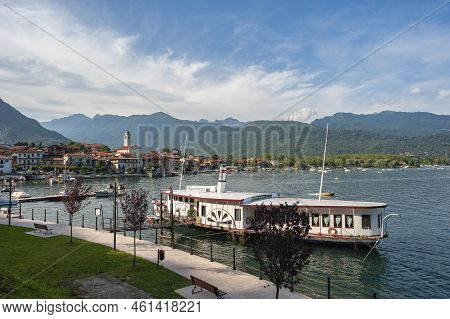 Feriolo, Italy - August 17, 2018: Townscape Of Feriolo With Ship Restaurant On The Lake Promenade. F