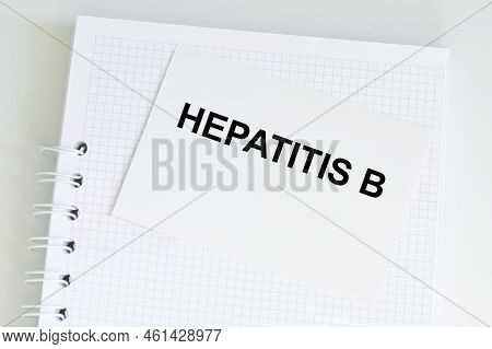 A Card With Text Hepatitis B On A Table, Medical Concept, Top View