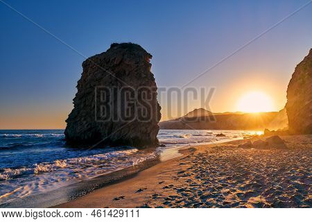 Colorful Sunset On Fyriplaka Beach, Milos, Greece. No People, Low Sun. Iconic Fyriplaka Lonely Rock 