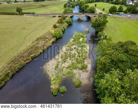 Aerial View Over River Wharfe And Pool Bridge, West Yorkshire