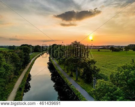 Colorful And Dramatic Sunset Over The Canal Dessel Schoten Aerial Photo Shot By A Drone In Rijkevors