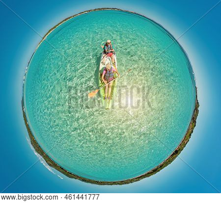 Tiny Planet 360 View Of Kayak From Piantarella Beach. Aerial View Of Piana Island In Corsica Of Fran