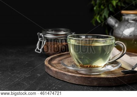 Freshly Made Buckwheat Tea Served On Grey Table, Space For Text