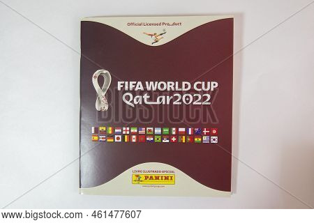 Bauru, Brazil - 09.12.22: Top View Of Panini Album Fifa World Cup 2022 - Qatar On The Desk. Collecti