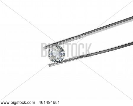 Brilliant Cut Diamond Held By Tweezers. For Design
