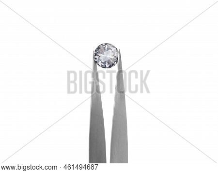 Diamond On White Background Held In Diamond Tweezers